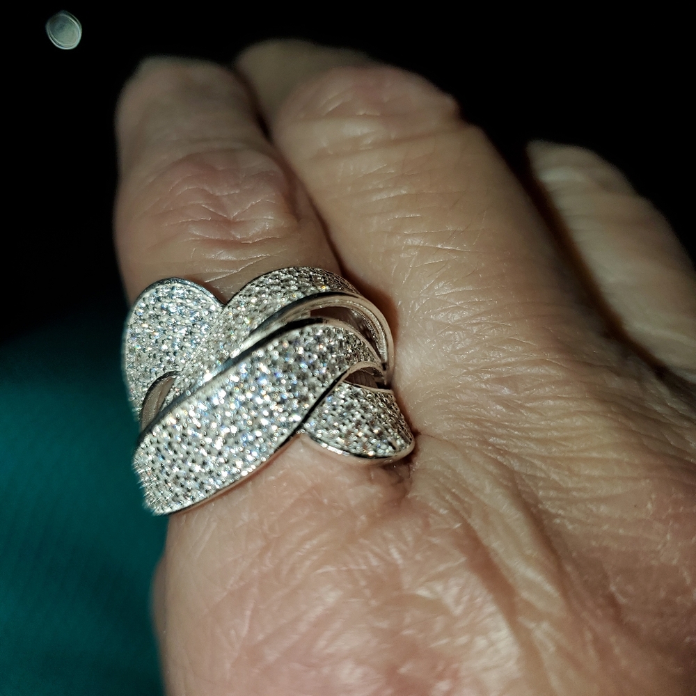 NWOT Sterling silver with over a 100 CZs.  Size 8 1/2.